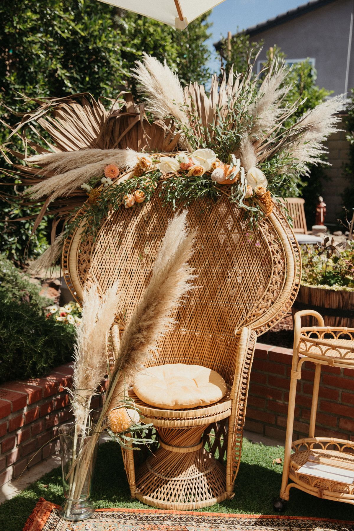 Guest at the Sip Tide peacock chair